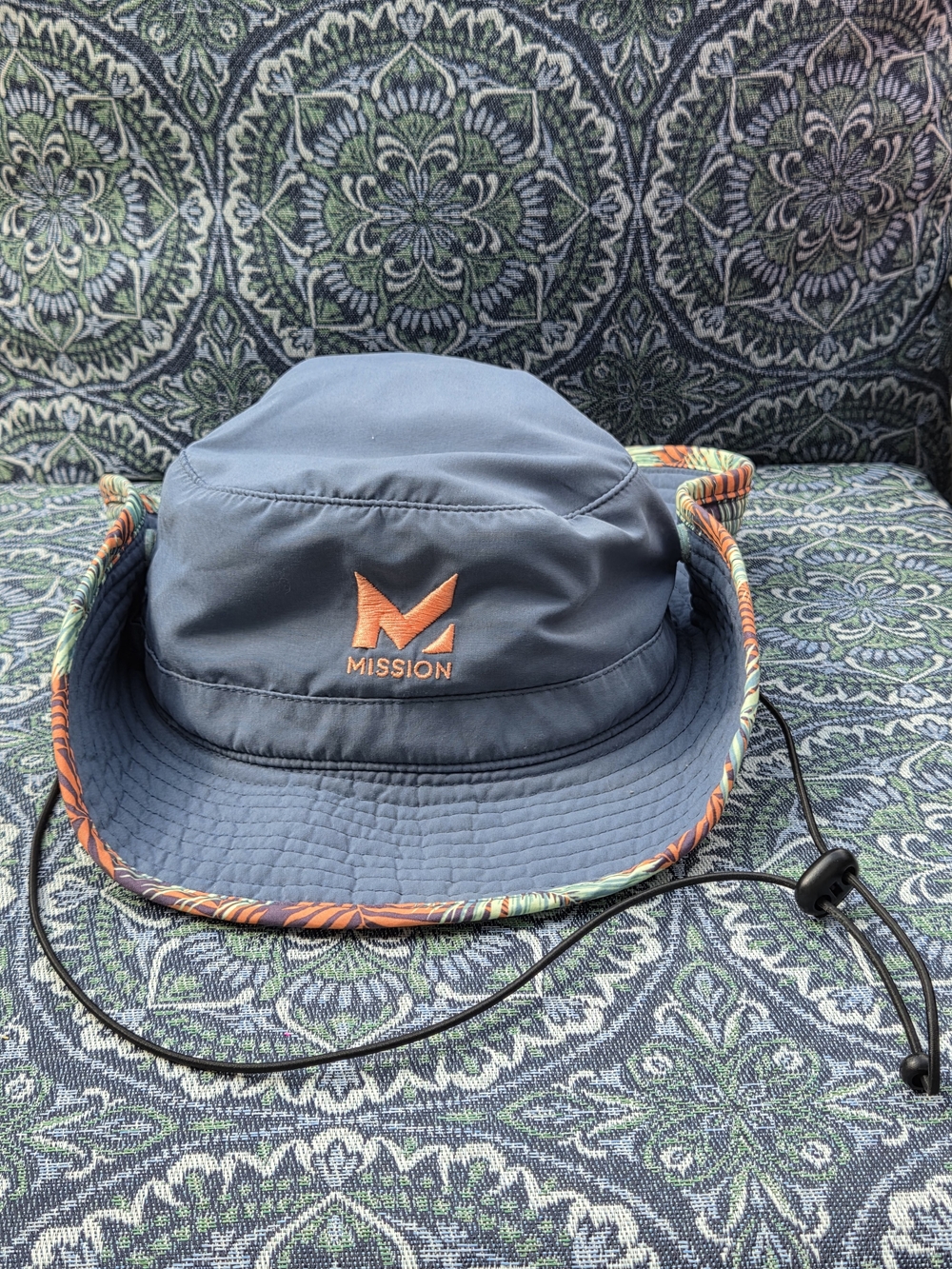 Mission Cooling Navy Bucket Hat with Orange Logo and Floral Trim